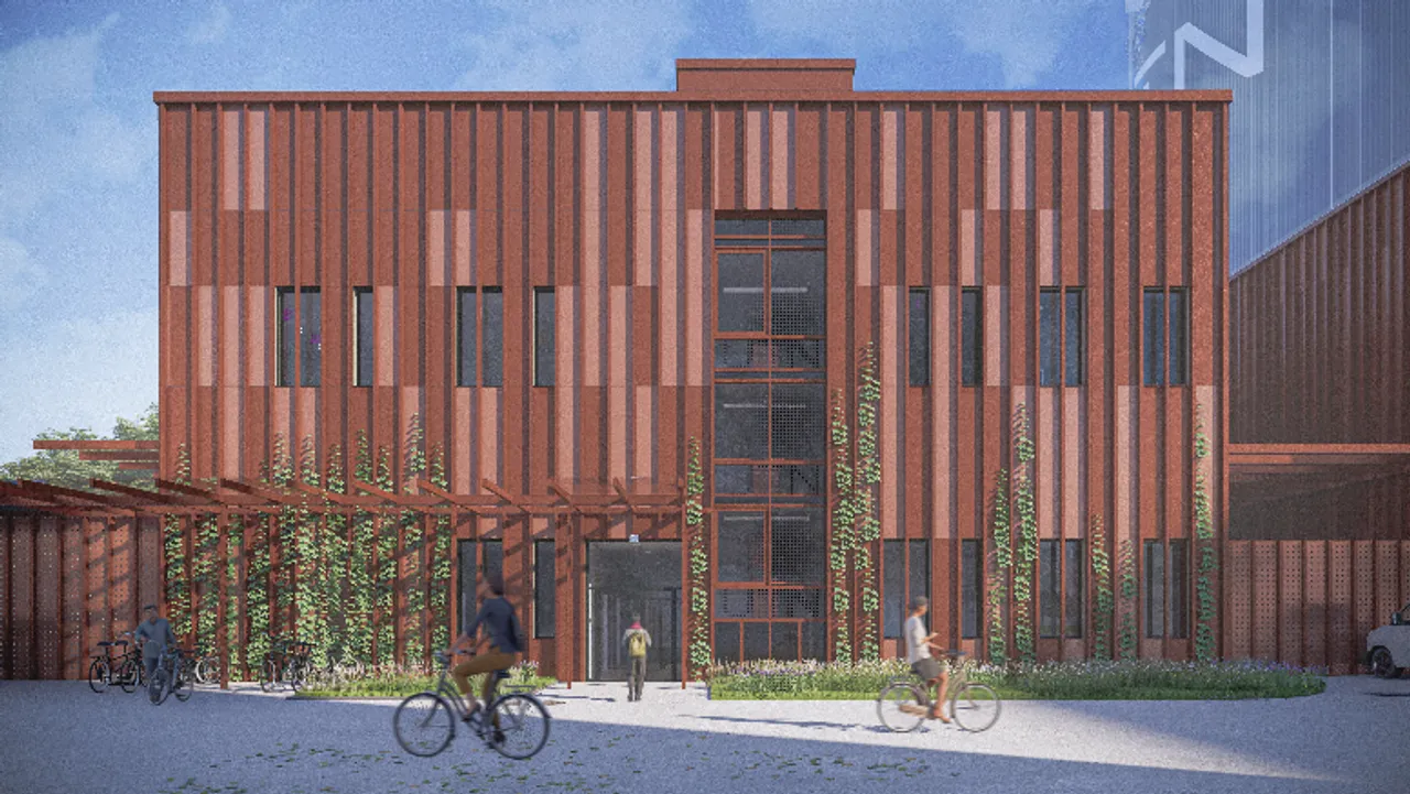 Logistikzentrum und Energiezentrale erhalten eine Metallfassade mit bodengebundener Begrünung.