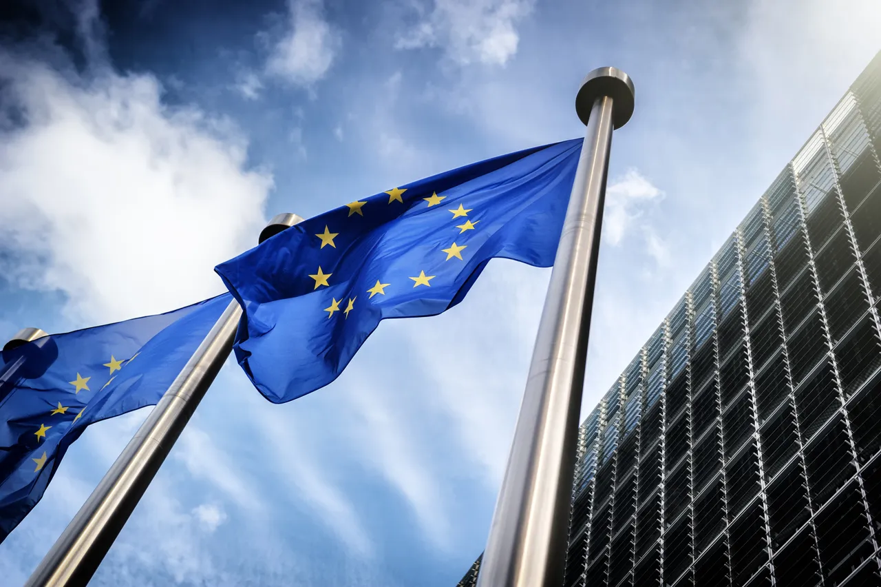 European Union flags on blue sky background